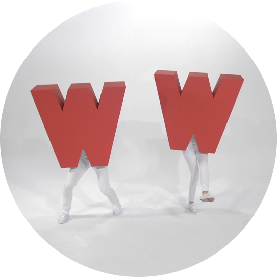 two people in W costumes